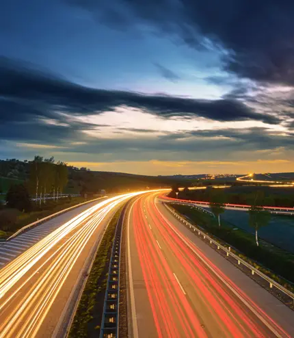 Late night view of a lighted highway Late night view of a lighted highway