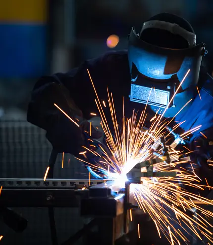 An industrial welder at work An industrial welder at work